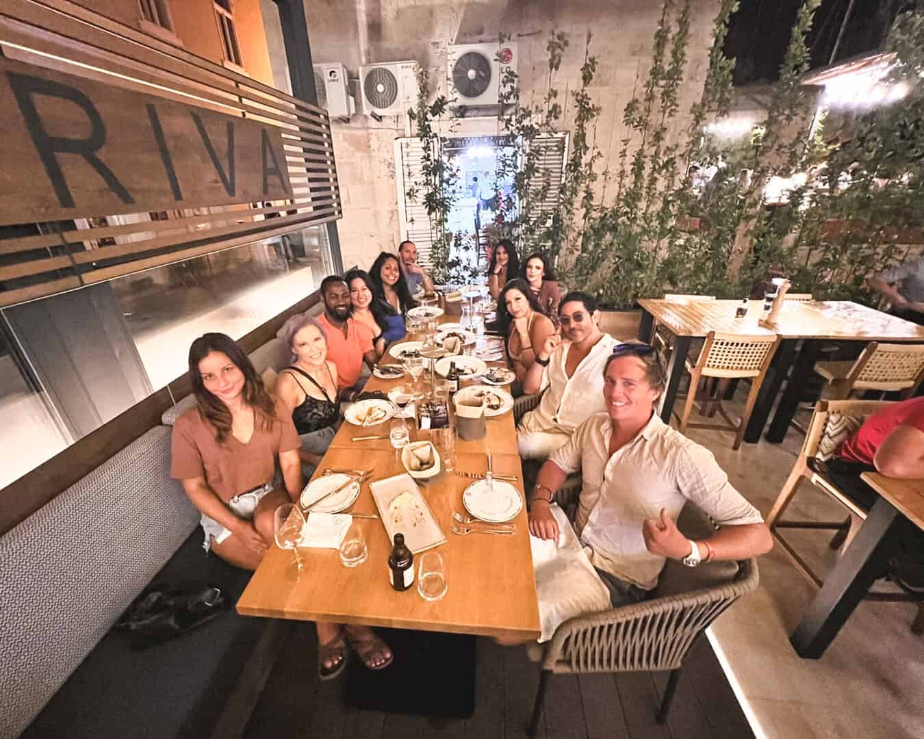 Group at Taverna Riva eating dinner