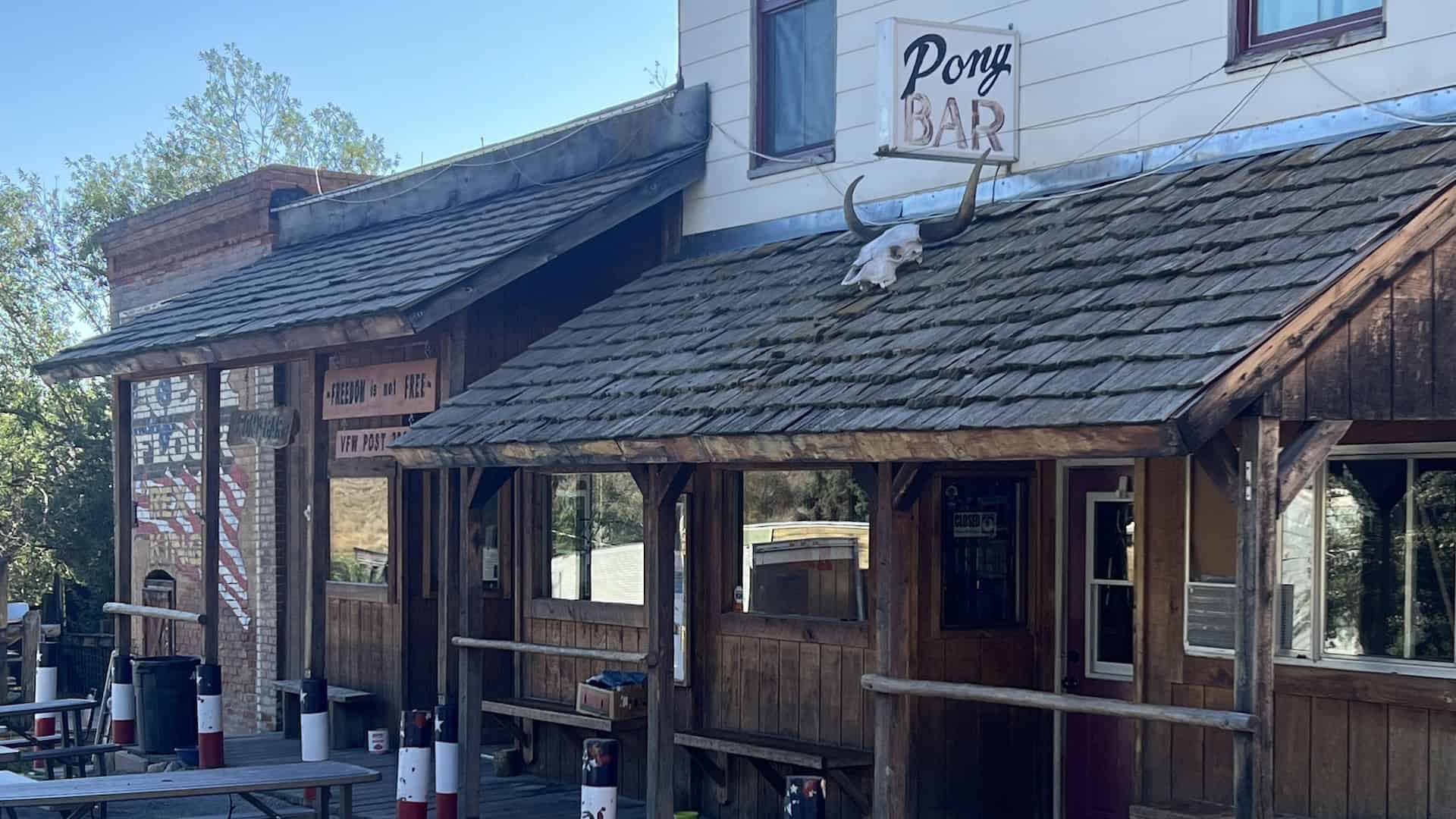 Outside the Pony Bar on our Cross-Country Motorcycle Trip