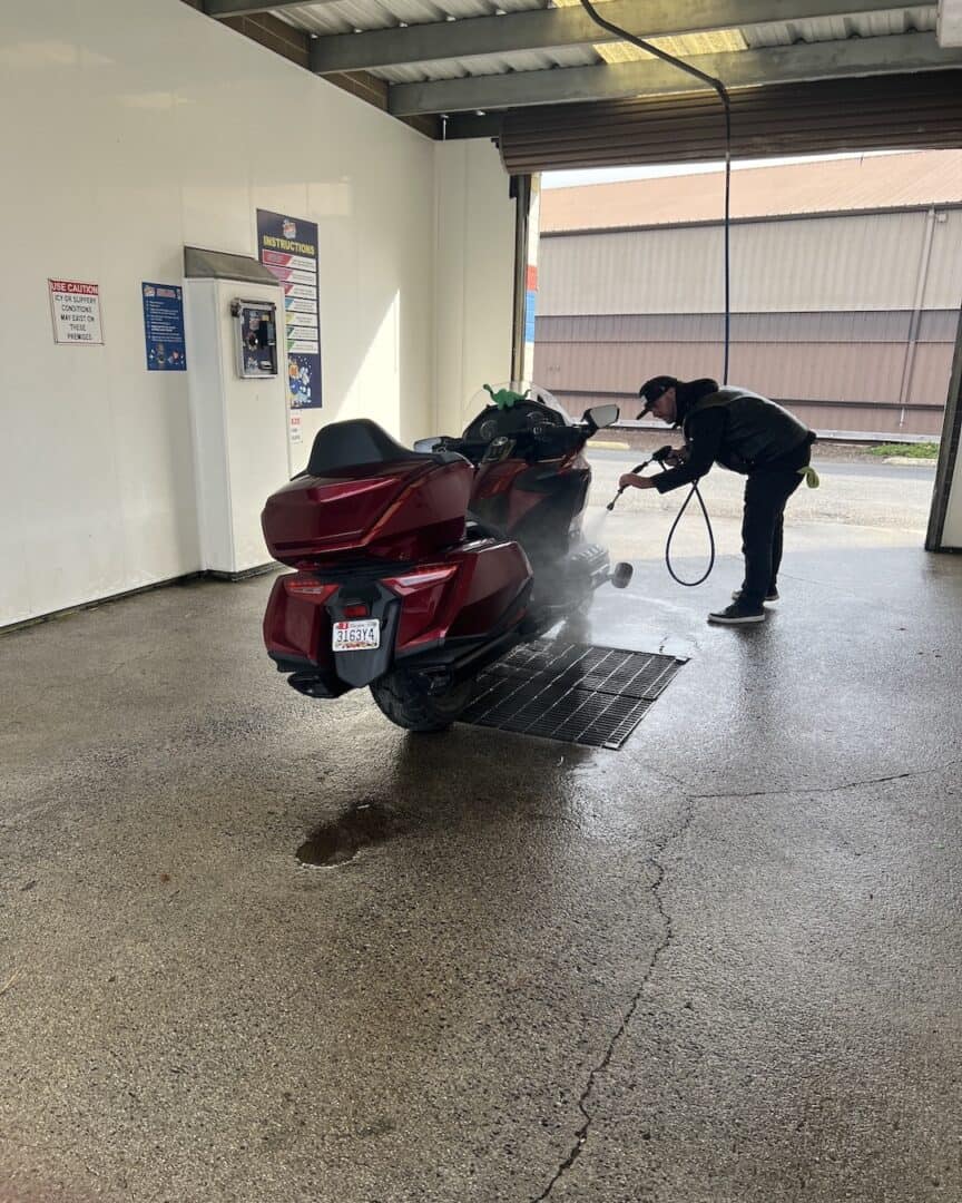 Cleaning the Goldwing during our cross-country motorcycle trip